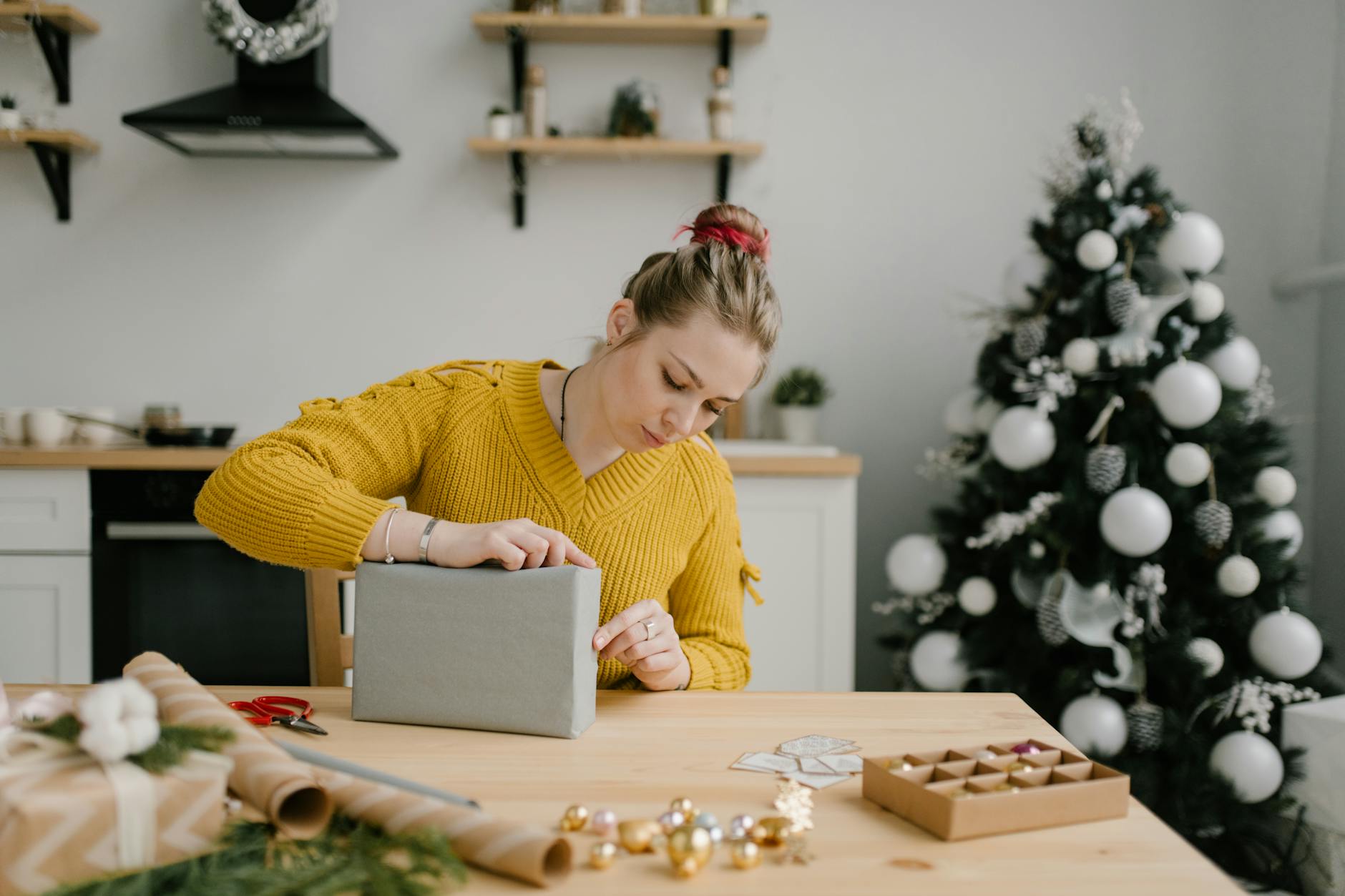 Handmade ice hockey Christmas ornament with SVG design on crafting table